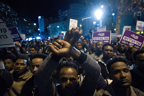 African asylum seekers and human rights activists protest against deportation in central Jerusalem. February 10, 2018. (Yaniv Nadav/Flash90)