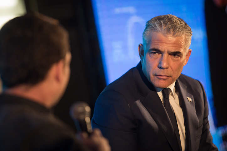 Head of the Yesh Atid party Yair Lapid speaks at the 15th annual Jerusalem Conference of the 'Besheva' group, on February 12, 2018. (Hadas Parush/Flash90)