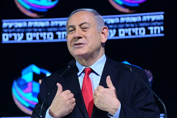 Prime Minister Benjamin Netanyahu speaks at the Muni Expo 2018 conference at the Tel Aviv Convention Center, February 14, 2018. (Tomer Neuberg/Flash90)