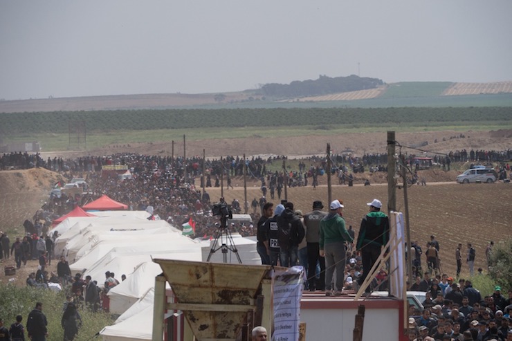 Tens of thousands of Palestinians gathered at several points along the Gaza-Israel border as part of the first day of the Great Return March, March 30, 2018. (+972 Magazine)