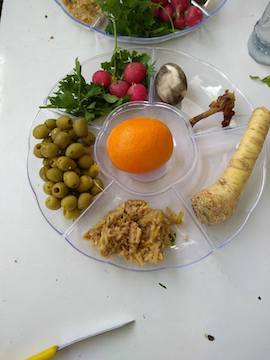 The Seder plate at the Freedom Seder in occupied Hebron, April 4, 2018. (Courtesy of All That's Left)