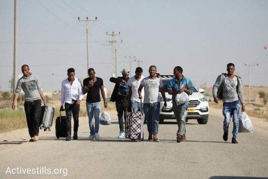 Asylum seekers released from Saharonim after Israel failed to present a new agreement that permits their deportation to Uganda. April 15, 2018. (Oren Ziv / Activestills.org)