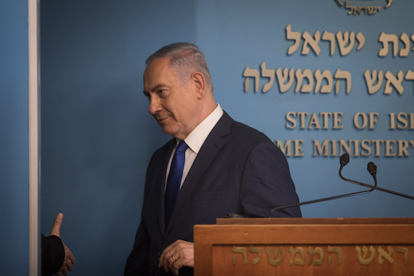 Prime Minister Benjamin Netanyahu at a press conference announcing the new agreement for handling asylum seekers and illegal African migrants in Israel, at the Prime Minister's Office in Jerusalem, on April 2, 2018. (Hadas Parush/Flash90)