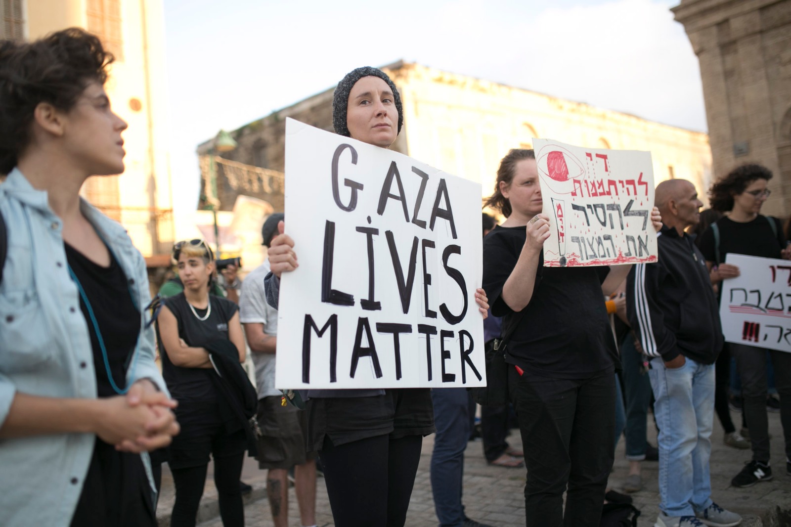 Dozens of Palestinians and Israelis protest the killing of unarmed protesters in Gaza at Jaffa's Clock Square, May 15, 2018. (Shiraz Grinbaum/Activestills.org)