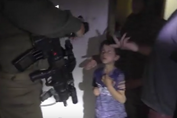A screenshot from the B'Tselem video documenting the raid on the Da'na family's home in Hebron.