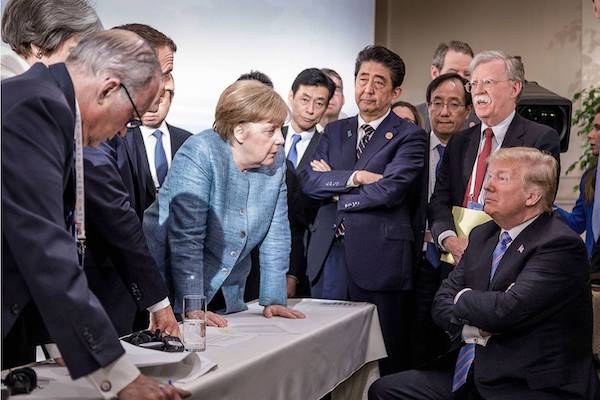 Angela Merkel faces down Donald Trump at the G7 Summit, June 9, 2018. (Jesco Denzel/German gov't)