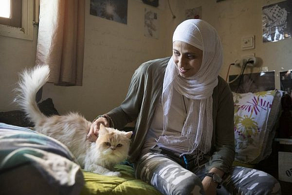 Palestinian poet Dareen Tatour seen in her home in the village of Reineh, northern Israel. (Oren Ziv)
