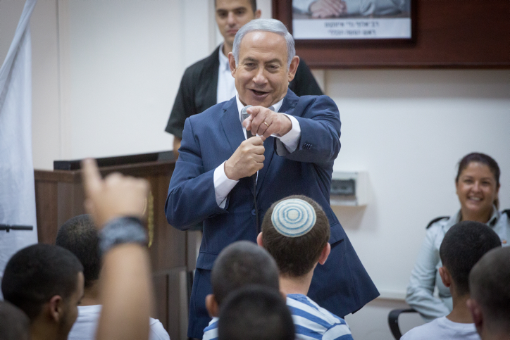 Israeli Prime Minister Benjamin Netanyahu speaks with newly recruited Israeli soldiers at the Tel Hashomer army base on July 26, 2018. (Miriam Alster/Flash90)