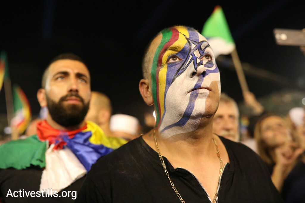 Tens of thousands of protesters joined the Druze community in rejecting the Jewish Nation-State Law at Rabin Square in Tel Aviv on August 5, 2018. (Oren Ziv/Activestills.org)