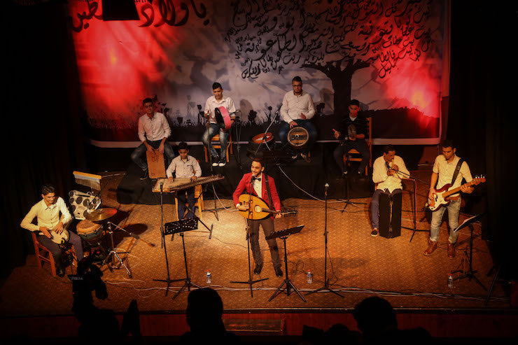 A musical performance held in March inside Gaza's Al-Meshal Cultural Center. (Mohamed Al Hajjar)