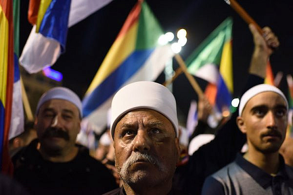 Elders of the Israeli Druze community are seen at a mass protest against the 'Jewish Nation-State law' in Rabin Square, Tel Aviv, August 4, 2018. (Gili Yaari/Flash90)
