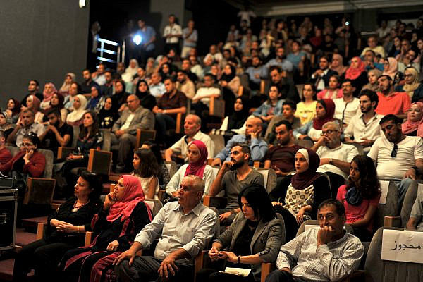 A full house at the premiere of Naila and the Uprising at the Red Crescent Cinema Hall in the Gaza Strip, September 2018. (Shareef Sarhan)