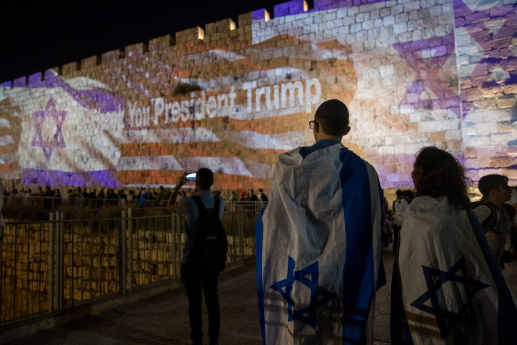 The Israeli and American flags are screened on the walls of Jerusalem's Old City, on May 13, 2018, ahead of the opening of the U.S. embassy in Jerusalem. (Yontan Sindel/Flash90)