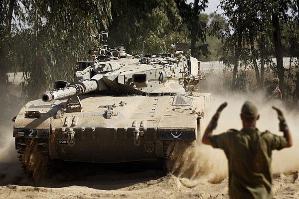 Illustrative file photo of Israeli troops deployed along the Gaza border. (Miriam Alster/Flash90)