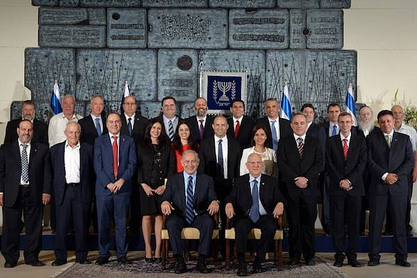 The ministers of the thirty-fourth government of Israel, alongside Prime Minister Benjamin Netanyahu and President Reuven Rivlin. (Avi Ohayon/GPO)