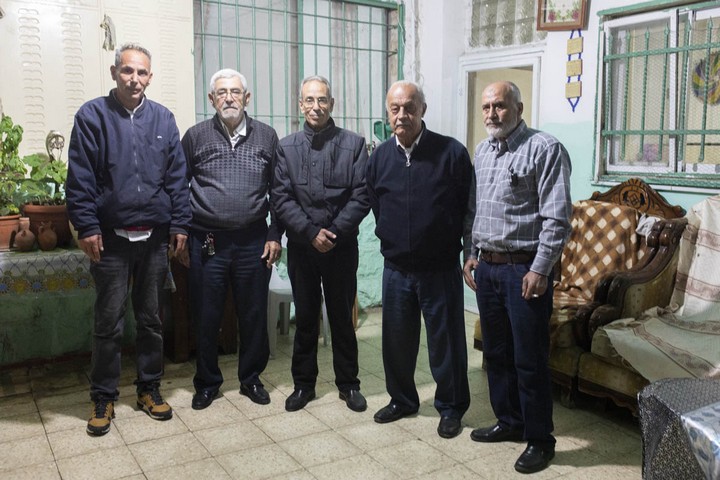 Leaders of the struggle in Sheikh Jarrah meet to discuss the possibility of evictions in the East Jerusalem neighborhood. Left to right: Saleh Diab, Nabil al-Kurd, Abed al-Saqafi, Muhammad Sabag, Araf Hamad. (Oren Ziv)