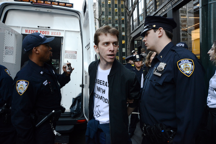 Police arrest a young American Jew during a sit-in organized by IfNotNow at the offices of the Anti-Defamation League in New York City to protest the institution’s support for Israel’s occupation policies. (photo: Gili Getz)