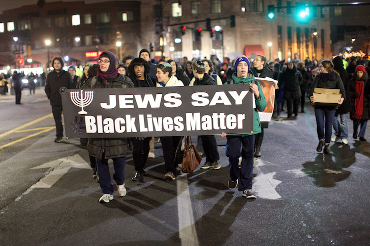 Jewish activists and allies rally as part of a Jewish Day of Action to End Police Violence, in Brookline, MA on December 16, 2014. (Tess Scheflan /Activestills.org)