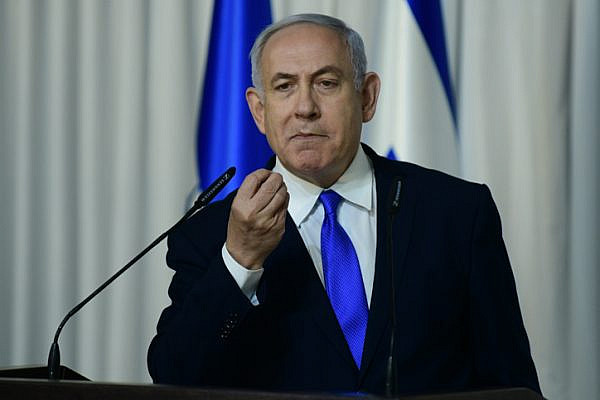 Prime Minister Benjamin Netanyahu delivers a statement to the media in Kfar Maccabiah, Ramat Gan on February 21, 2019. (Tomer Neuberg/Flash90)
