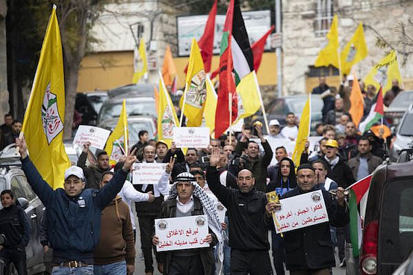 Hundreds of Palestinian, Israeli and international protesters march in Hebron to demand the end of settlements and segregation in the city, February 22, 2019. (Photo by Oren Ziv/Activestills.org)