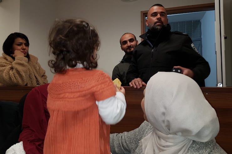Mustafa al-Haruf seen at an Interior Ministry tribunal with his wife and daughter, February 19, 2019, in Jerusalem.