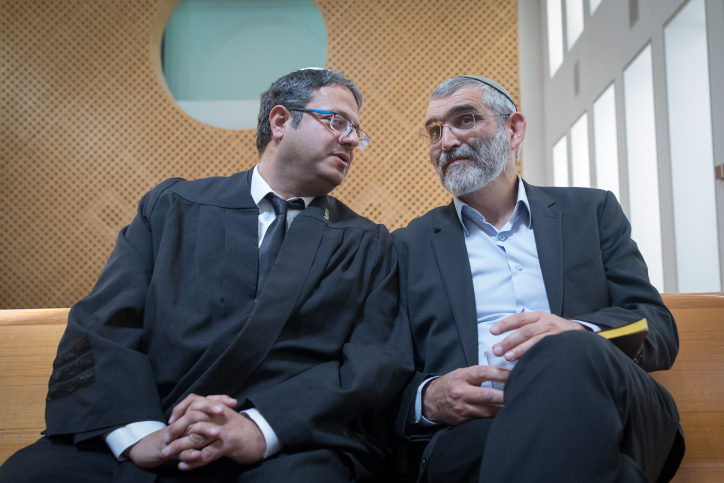 Otzma Yehudit party member Michael Ben Ari (right) and party member and attorney Itamar Ben Gvir seen at court hearing at the Supreme Court in Jerusalem, March 13, 2019. (Noam Revkin Fenton/Flash90)