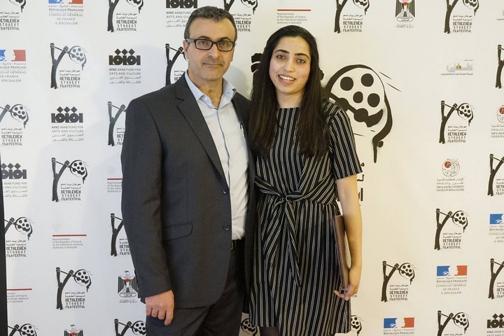 Shayma Awawdeh seen with Saed Andoni, the head of the Dar Al Kalima University's film department. (Bethlehem Student Film Festival)