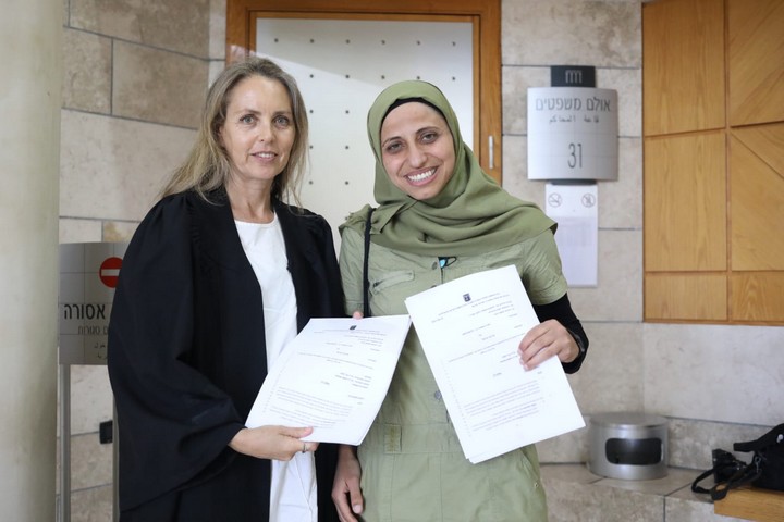 Dareen Tatour (right) and attorney Gaby Lasky seen at the Nazareth District Court after the court partially cleared Tatour of incitement to violence in a poem she published on Facebook, May 16, 2019. (Oren Ziv/Activestills.org) 