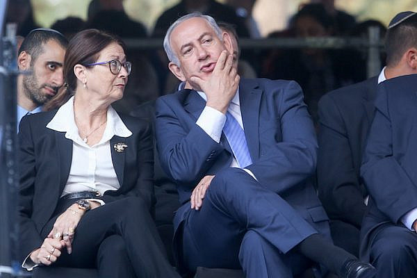 Israeli prime minister Benjamin Netanyahu with Supreme Court Chief Judge Esther Hayut at a memorial service marking 22 years since the assassination of Prime Minister Yitzhak Rabin, held at Mount Herzl cemetery in Jerusalem. November 1, 2017. (Marc Israel Sellem/POOL)