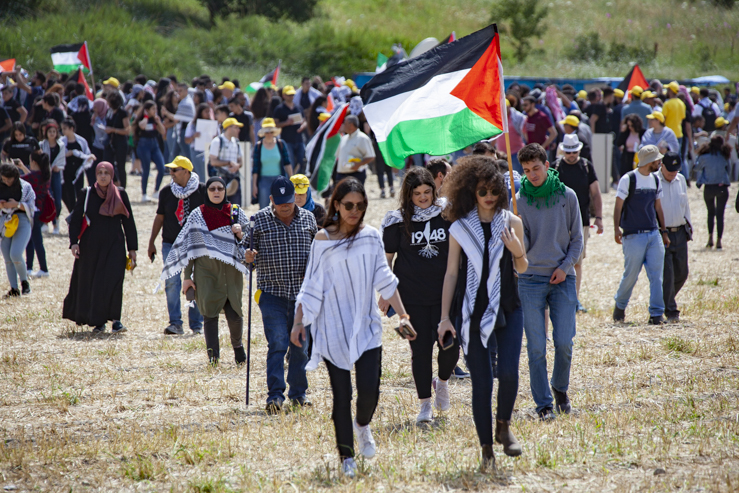 Palestinian citizens of Israel take part in the Return March, held at the destroyed village of Khubbeiza, to mark Nakba Day, May 9, 2019. (Mati Milstein)