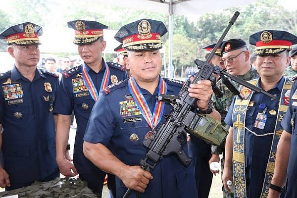 Former Philippine National Police Chief and current Senate of the Philippines Ronald dela Rosa seen holding an Israeli-made rifle. (Courtesy of Philippine National Police)