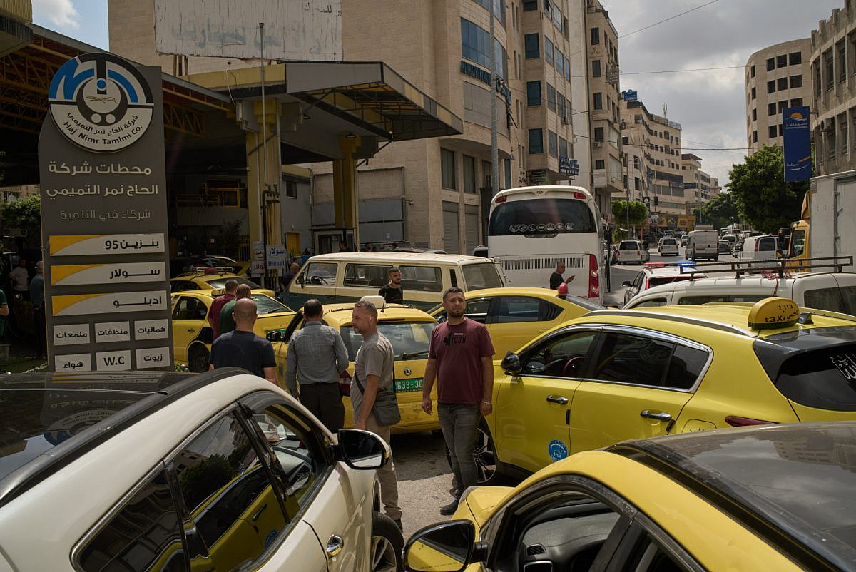 Palestinian taxi drivers gather at a gas station amid a fuel shortage in the West Bank city of Nablus, July 26, 2026. (AP Photo/Leo Correa) Palestinian taxi drivers gather at a gas station amid a fuel shortage in the West Bank city of Nablus, July 26, 2026. (AP Photo/Leo Correa)