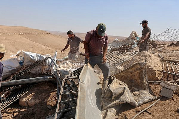 Palestinian residents inspect the damage several hours after Israeli forces demolished northern Fakhit in Masafer Yatta, in the southern West Bank, September 8, 2026. (Mosab Shawer/Activestills)