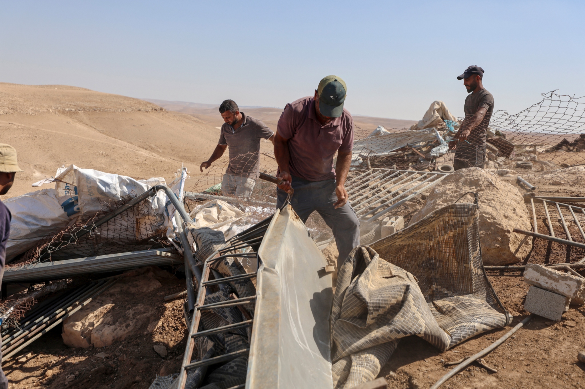 Palestinian residents inspect the damage several hours after Israeli forces demolished northern Fakhit in Masafer Yatta, in the southern West Bank, September 8, 2026. (Mosab Shawer/Activestills)