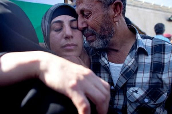 Hana Shalabi and her father reunited in her last release, October 2011 (Oren Ziv / Activestills)