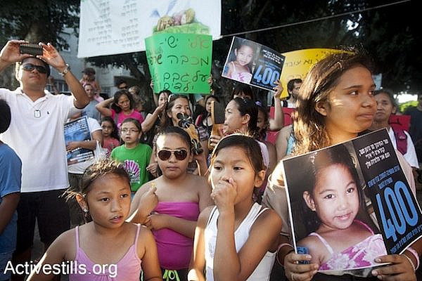 Filipino children at protest against arrest of child of migrant worker (Activestills)