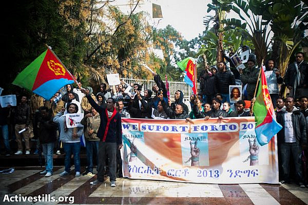 Eritrean refugees living in Israel take part in a protest outside the Eritrean embassy in the city of Ramat Gan, February 1. 2013. The protesters were calling for the ousting of the dictatorship regime in Eritrea, and the release of all political prisoners. (Photo by: Yotam Ronen/ Activestills.org)