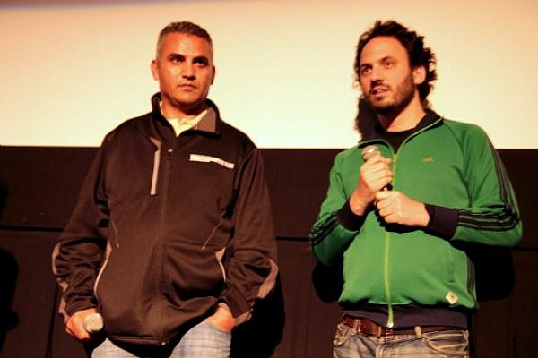 Emad Burnet (left) and Guy Davidi answering questions about '5 Broken Cameras' at the Film Forum in New York City (credit: Lisa Goldman)