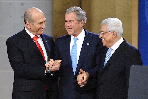 Prime Minister Ehud Olmert, President George W. Bush, and President Mahmoud Abbas at Annapolis, November 27, 2007 (Photo: Gin Kai)