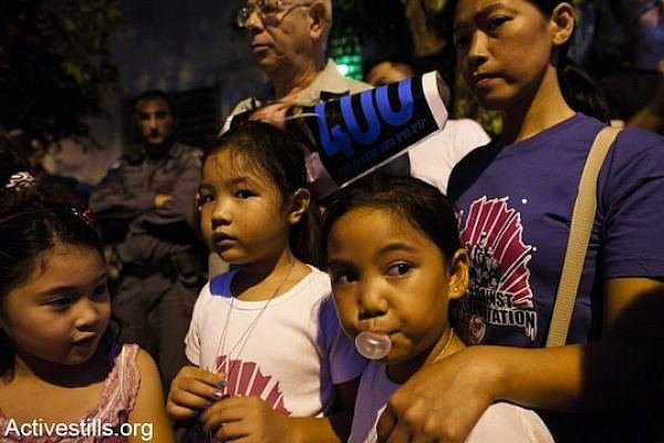 Filipino migrant workers participate in a protest against deportations, Tel Aviv. (photo: Activestills)