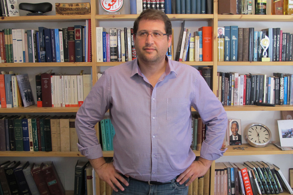 Attorney Michael Sfard in his Tel Aviv law office, July 23, 2013. (Photo: Matt Surrusco)