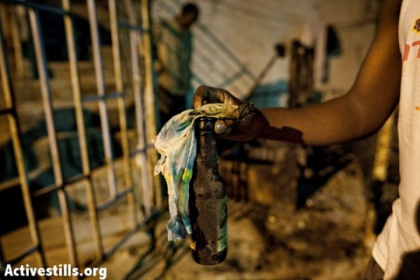 A Molotov cocktail used in an attack on African homes in Tel Aviv (Oren Ziv / Activestills)