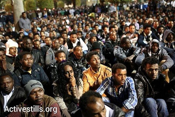 Thousands of African asylum seekers meet in south Tel Aviv's Levinsky Park to plan a three-day general strike protesting Israel's immigration policies and asylum regime, January 4, 2014. (Photo: Activestills.org)
