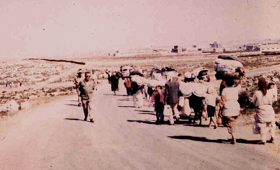 IDF soldiers expel the residents of Imwas from their village during the 1967 Six Day War. (photo: www.palestineremembered.com)