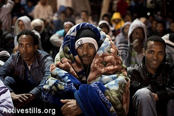 African asylum seekers staging a sit-in at Levinsky Park in Tel Aviv, protesting against the new detention center, calling to the Israeli government to recognize their refugee rights, February 2, 2014. (Activestills.org)