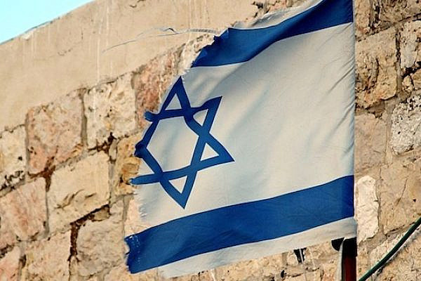 A tattered Israeli flag in Jerusalem. (Photo by David Shankbone/CC)