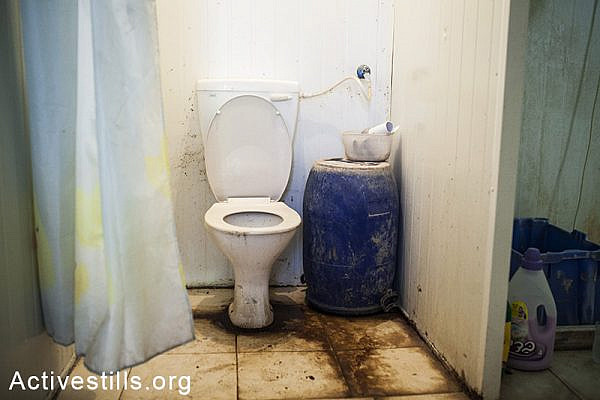 A view on the toilet in the workers' residence. (Activestills.org)