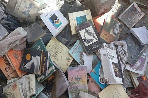 Burned books from the collection of Gaza poet Othman Hussein (photo: Maysoon Hussein)