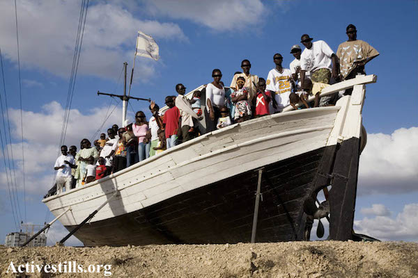 Darfuri refugees pose for a poster against their deportation from Israel. (Activestills.org)