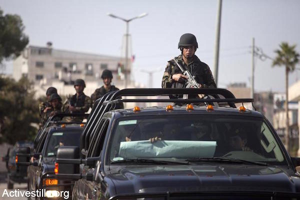 File photo of Palestinian security forces in the West Bank. (Photo by Activestills.org)